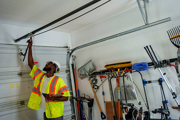Professional Garage Door Installation technician working in North Judson, IN